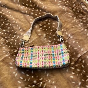 The Sak small woven purse.